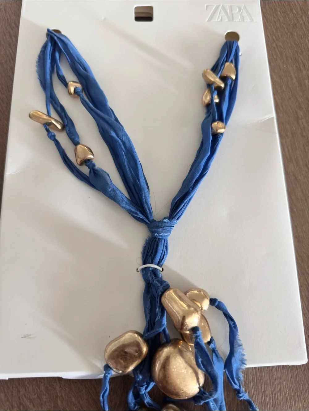 Zara Blue Fabric Necklace with Gold Accent Metal Pieces